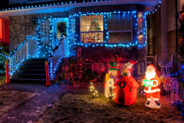 Exterior of a home covered in Christmas lights and decorations